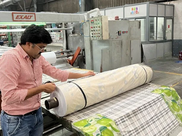 Quality check of a laminated printed PVC film roll